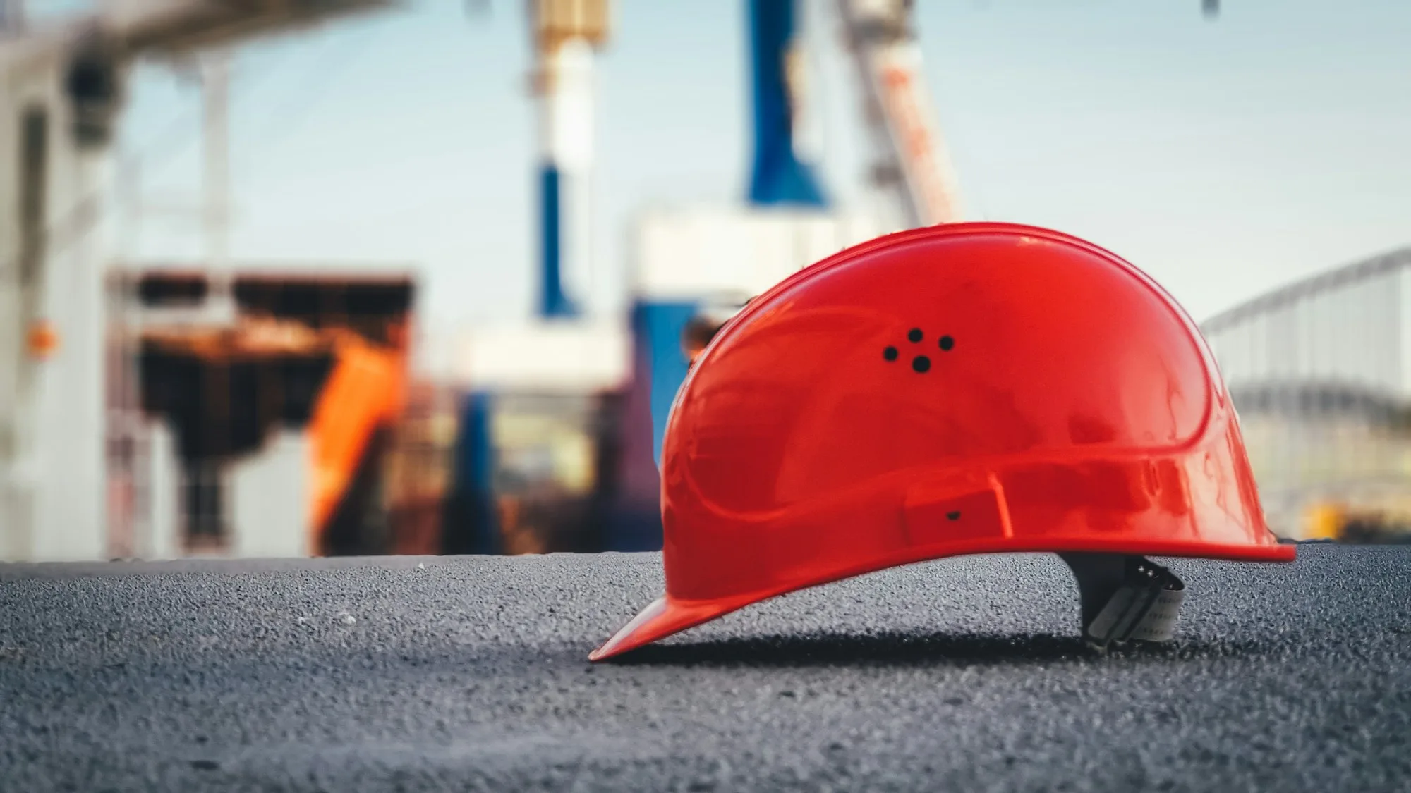 Construction worker in hard hat on an active jobsite