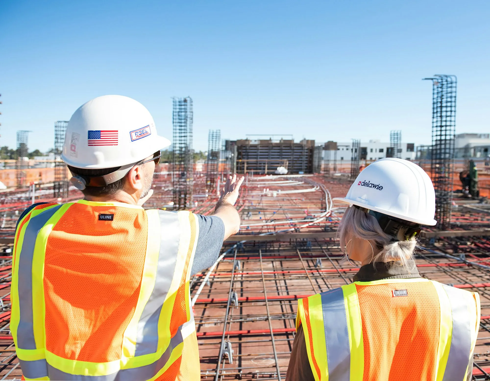 A construction professional measuring with precision